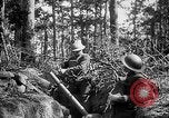 Image of 165th Infantry Regiment troops fire a mortar France, 1918, second 22 stock footage video 65675068484