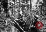 Image of 165th Infantry Regiment troops fire a mortar France, 1918, second 23 stock footage video 65675068484