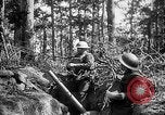 Image of 165th Infantry Regiment troops fire a mortar France, 1918, second 26 stock footage video 65675068484