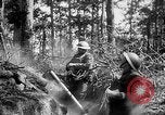 Image of 165th Infantry Regiment troops fire a mortar France, 1918, second 27 stock footage video 65675068484