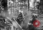 Image of 165th Infantry Regiment troops fire a mortar France, 1918, second 29 stock footage video 65675068484