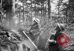Image of 165th Infantry Regiment troops fire a mortar France, 1918, second 30 stock footage video 65675068484