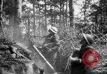 Image of 165th Infantry Regiment troops fire a mortar France, 1918, second 31 stock footage video 65675068484