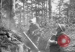 Image of 165th Infantry Regiment troops fire a mortar France, 1918, second 32 stock footage video 65675068484