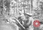 Image of 165th Infantry Regiment troops fire a mortar France, 1918, second 33 stock footage video 65675068484