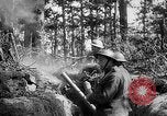 Image of 165th Infantry Regiment troops fire a mortar France, 1918, second 36 stock footage video 65675068484