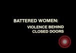 Image of battered women United States USA, 1977, second 32 stock footage video 65675068525