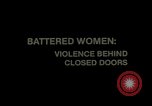 Image of battered women United States USA, 1977, second 34 stock footage video 65675068525