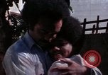 Image of battered women United States USA, 1977, second 48 stock footage video 65675068525