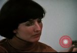 Image of battered women United States USA, 1977, second 10 stock footage video 65675068526