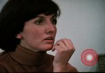 Image of battered women United States USA, 1977, second 14 stock footage video 65675068526