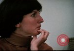 Image of battered women United States USA, 1977, second 16 stock footage video 65675068526