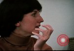Image of battered women United States USA, 1977, second 17 stock footage video 65675068526