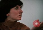 Image of battered women United States USA, 1977, second 18 stock footage video 65675068526
