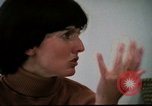 Image of battered women United States USA, 1977, second 20 stock footage video 65675068526