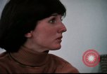 Image of battered women United States USA, 1977, second 22 stock footage video 65675068526