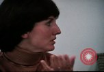 Image of battered women United States USA, 1977, second 24 stock footage video 65675068526