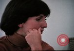 Image of battered women United States USA, 1977, second 27 stock footage video 65675068526