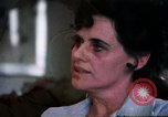 Image of battered women United States USA, 1977, second 28 stock footage video 65675068526