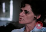 Image of battered women United States USA, 1977, second 30 stock footage video 65675068526