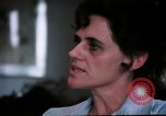 Image of battered women United States USA, 1977, second 32 stock footage video 65675068526