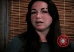 Image of battered women United States USA, 1977, second 46 stock footage video 65675068526