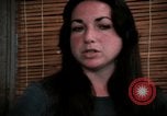 Image of battered women United States USA, 1977, second 48 stock footage video 65675068526