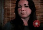 Image of battered women United States USA, 1977, second 49 stock footage video 65675068526