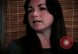 Image of battered women United States USA, 1977, second 52 stock footage video 65675068526