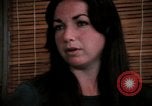 Image of battered women United States USA, 1977, second 53 stock footage video 65675068526