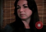 Image of battered women United States USA, 1977, second 54 stock footage video 65675068526