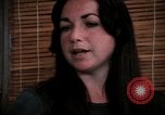 Image of battered women United States USA, 1977, second 55 stock footage video 65675068526