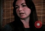 Image of battered women United States USA, 1977, second 56 stock footage video 65675068526
