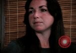 Image of battered women United States USA, 1977, second 57 stock footage video 65675068526