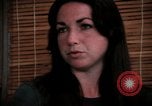 Image of battered women United States USA, 1977, second 58 stock footage video 65675068526