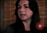 Image of battered women United States USA, 1977, second 59 stock footage video 65675068526