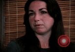 Image of battered women United States USA, 1977, second 60 stock footage video 65675068526
