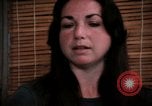 Image of battered women United States USA, 1977, second 62 stock footage video 65675068526