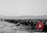 Image of US soldiers witness atomic explosion Camp Desert Rock Nevada USA, 1951, second 15 stock footage video 65675068697