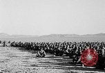Image of US soldiers witness atomic explosion Camp Desert Rock Nevada USA, 1951, second 22 stock footage video 65675068697