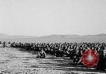 Image of US soldiers witness atomic explosion Camp Desert Rock Nevada USA, 1951, second 23 stock footage video 65675068697