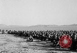 Image of US soldiers witness atomic explosion Camp Desert Rock Nevada USA, 1951, second 25 stock footage video 65675068697