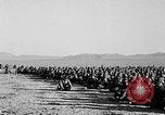 Image of US soldiers witness atomic explosion Camp Desert Rock Nevada USA, 1951, second 59 stock footage video 65675068697