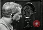 Image of Man listens to vintage radio United States USA, 1935, second 3 stock footage video 65675068706