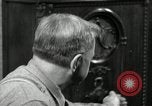 Image of Man listens to vintage radio United States USA, 1935, second 5 stock footage video 65675068706