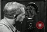 Image of Man listens to vintage radio United States USA, 1935, second 6 stock footage video 65675068706