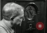 Image of Man listens to vintage radio United States USA, 1935, second 7 stock footage video 65675068706