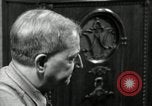 Image of Man listens to vintage radio United States USA, 1935, second 8 stock footage video 65675068706