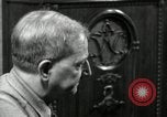 Image of Man listens to vintage radio United States USA, 1935, second 9 stock footage video 65675068706