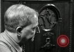 Image of Man listens to vintage radio United States USA, 1935, second 11 stock footage video 65675068706